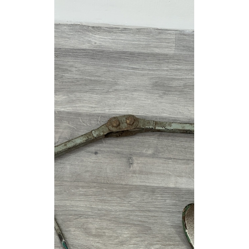 118 - A mid 20th century Mek-Elek green and grey painted metal articulated industrial machinist's desk lam... 