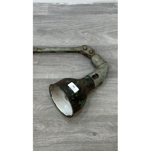 118 - A mid 20th century Mek-Elek green and grey painted metal articulated industrial machinist's desk lam... 
