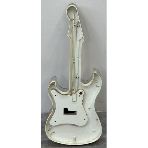 126 - A plastic Union Jack neon guitar wall clock - approx. 74cm long