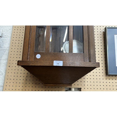 133 - An early 20th century oak cased Westminster chime wall clock with pendulum and key - approx. 80cm hi... 