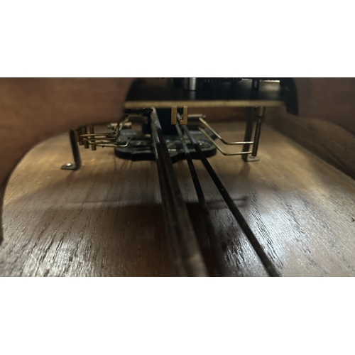 133 - An early 20th century oak cased Westminster chime wall clock with pendulum and key - approx. 80cm hi... 