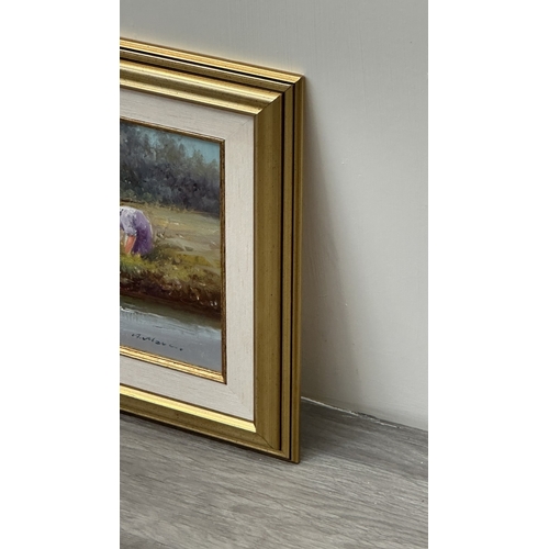 135 - A mid/late 20th century gilt framed oil on canvas of a flower picking scene, signed lower right - ap... 