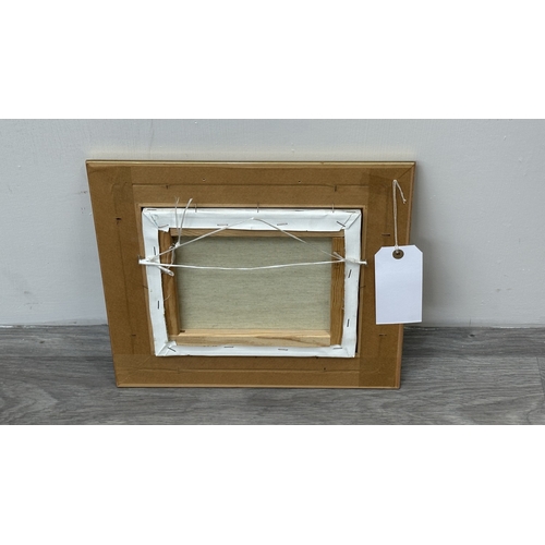 135 - A mid/late 20th century gilt framed oil on canvas of a flower picking scene, signed lower right - ap... 