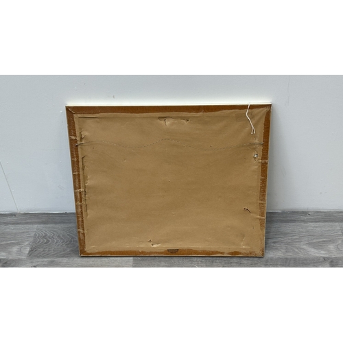 139 - A mid/late 20th century framed oil on board depicting a seascape - approx. 47cm high x 57cm wide