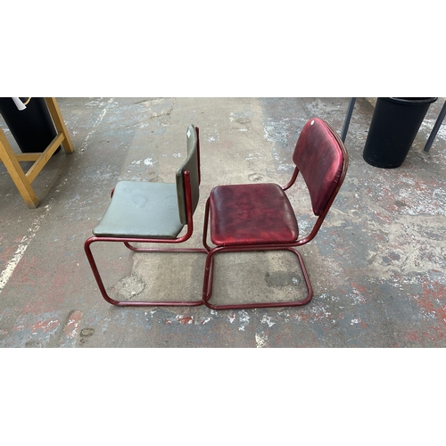 13A - Two mid 20th century red painted tubular metal and vinyl upholstered dining chairs to include one br... 