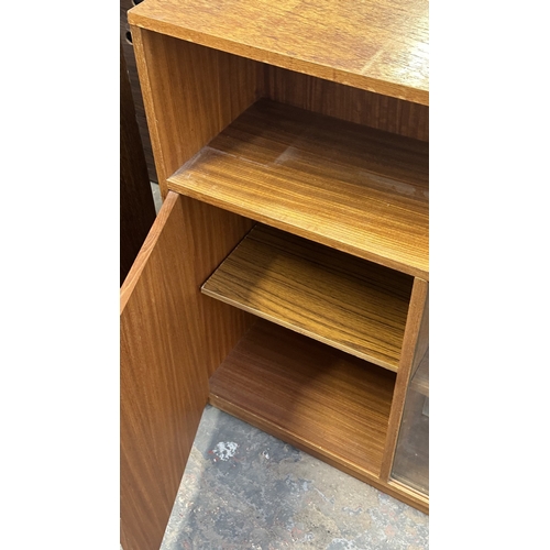 13C - A mid 20th century Stateroom by Stonehill teak bookcase with two glass sliding doors - approx. 83cm ... 
