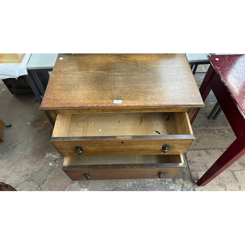 13F - An early 20th century oak chest of drawers - approx. 88cm high x 75cm wide x 45.5cm deep