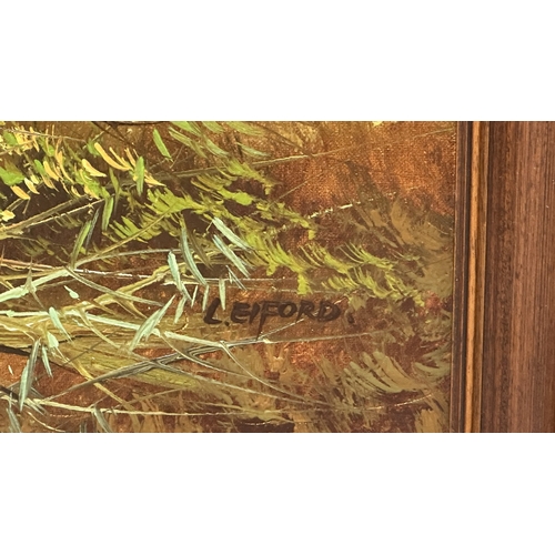 144 - A late 20th century framed oil on canvas of a hunting dog scene, signed L. Eiford - approx. 58cm hig... 