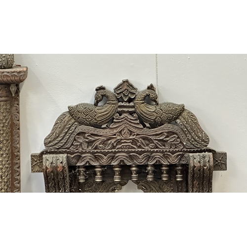 148 - Three Indian painted and carved wooden jharoka window frames - largest approx. 94cm high x 55cm wide