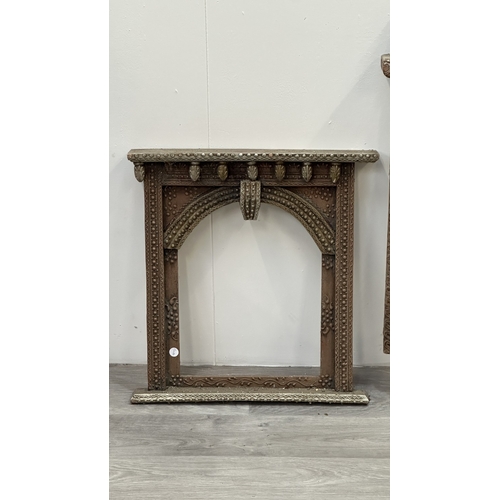 148 - Three Indian painted and carved wooden jharoka window frames - largest approx. 94cm high x 55cm wide