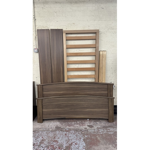 2 - A modern walnut effect four piece bedroom suite comprising dressing table - approx. 88cm high x 96cm... 
