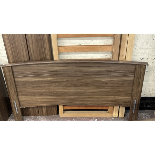 2 - A modern walnut effect four piece bedroom suite comprising dressing table - approx. 88cm high x 96cm... 