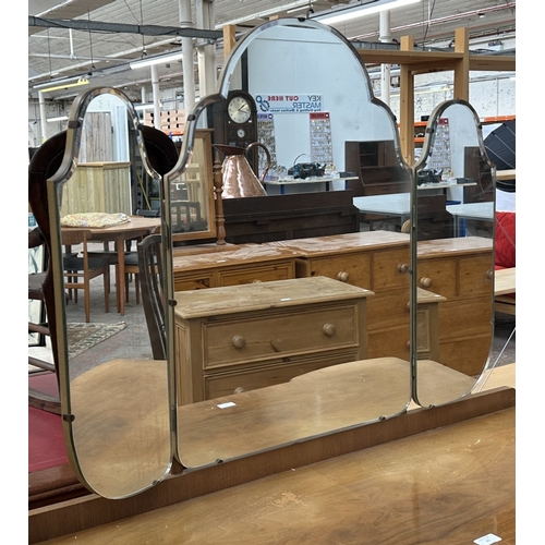 25 - A mid 20th century Heathland Furniture walnut dressing table and stool - approx. 157cm high includin... 