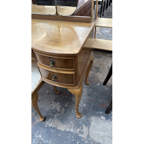 25 - A mid 20th century Heathland Furniture walnut dressing table and stool - approx. 157cm high includin... 