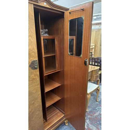 26 - A mid 20th century Heathland Furniture walnut double wardrobe - approx. 192cm high x 95cm wide x 55c... 