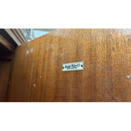 27 - A mid 20th century Heathland Furniture walnut double wardrobe - approx. 198cm high x 125cm wide x 55... 