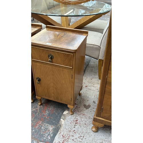 28 - A pair of mid 20th century Heathland Furniture walnut bedside cabinets - approx. 69cm high x 39cm wi... 