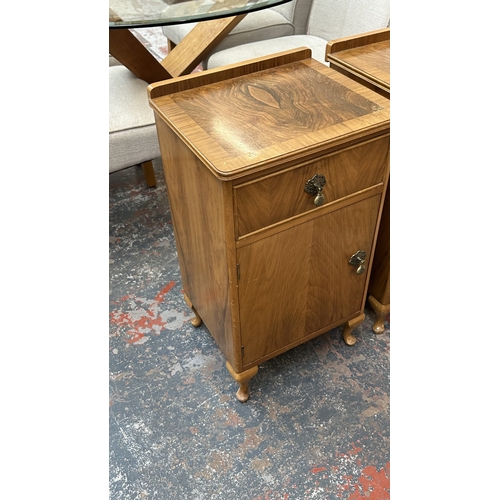 28 - A pair of mid 20th century Heathland Furniture walnut bedside cabinets - approx. 69cm high x 39cm wi... 