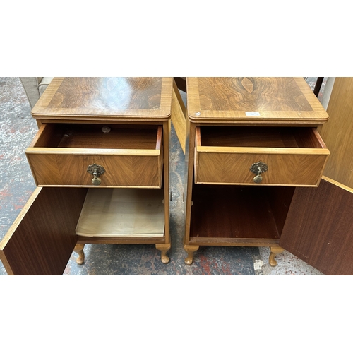 28 - A pair of mid 20th century Heathland Furniture walnut bedside cabinets - approx. 69cm high x 39cm wi... 