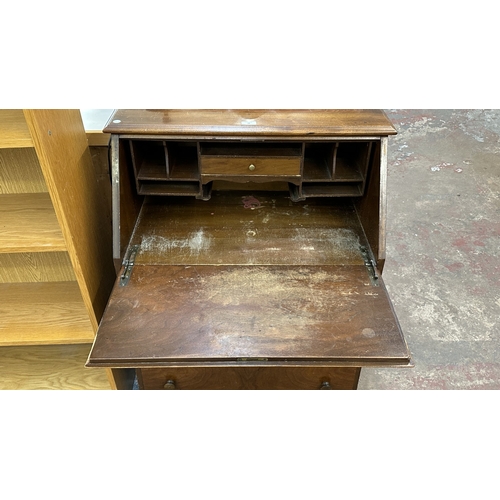 29 - A mid 20th century walnut bureau - approx. 106cm high x 76cm wide x 43cm deep