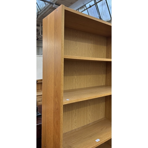 30 - A modern oak effect six tier bookcase - approx. 203cm high x 80cm wide x 28cm deep