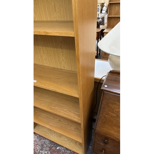 30 - A modern oak effect six tier bookcase - approx. 203cm high x 80cm wide x 28cm deep