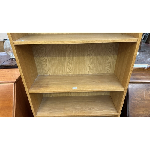 30 - A modern oak effect six tier bookcase - approx. 203cm high x 80cm wide x 28cm deep