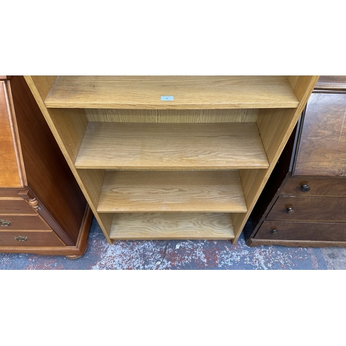 30 - A modern oak effect six tier bookcase - approx. 203cm high x 80cm wide x 28cm deep