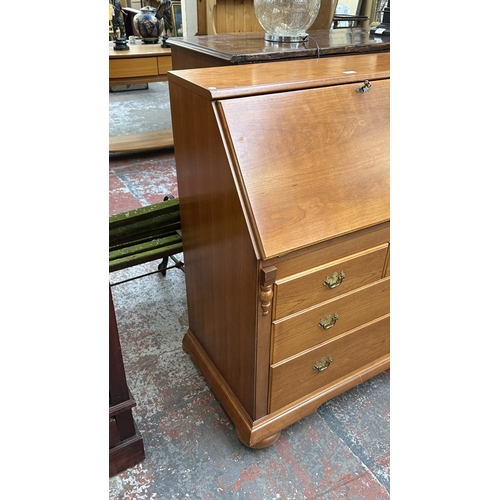 31 - A William Lawrence cherrywood bureau - approx. 107cm high x 97cm wide x 52cm deep