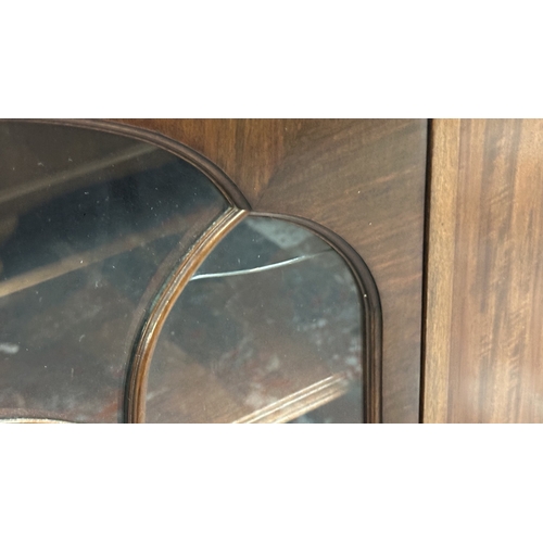 33 - An early 20th century mahogany display cabinet - approx. 116cm high x 121cm wide x 33cm deep