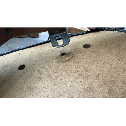 37C - A mid 20th century Elliotts of Newbury teak circular drop leaf dining table and four black vinyl cha... 