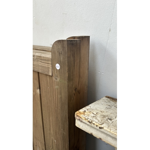 43 - A pair of tanalised timber driveway gates - approx. 144cm high x 134cm wide