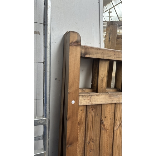 44 - A pair of tanalised timber driveway gates - approx. 182cm high x 160cm wide