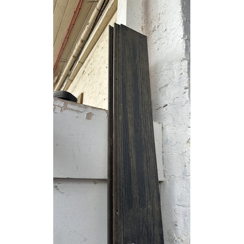 47 - Twenty two pieces of composite cladding - largest approx. 227cm long x 15cm wide and shortest approx... 