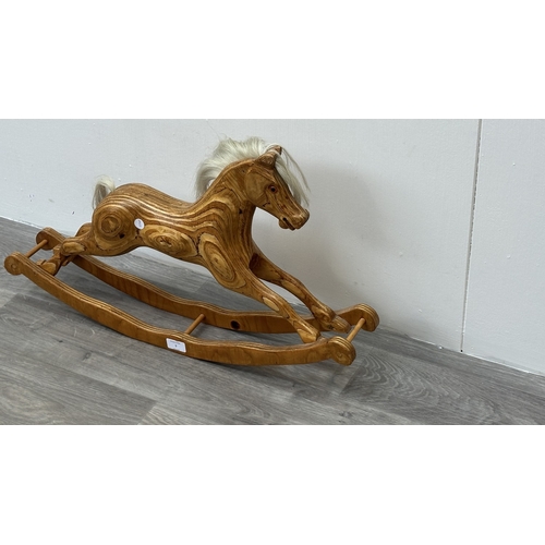 5 - A handcrafted wooden rocking horse with real hair and glass eyes - approx. 43cm high x 11cm wide x 7... 