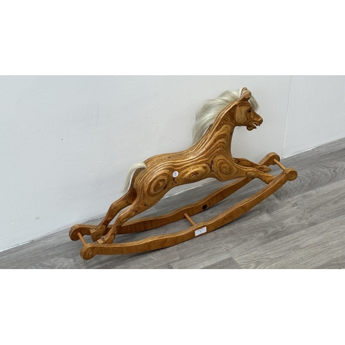 5 - A handcrafted wooden rocking horse with real hair and glass eyes - approx. 43cm high x 11cm wide x 7... 