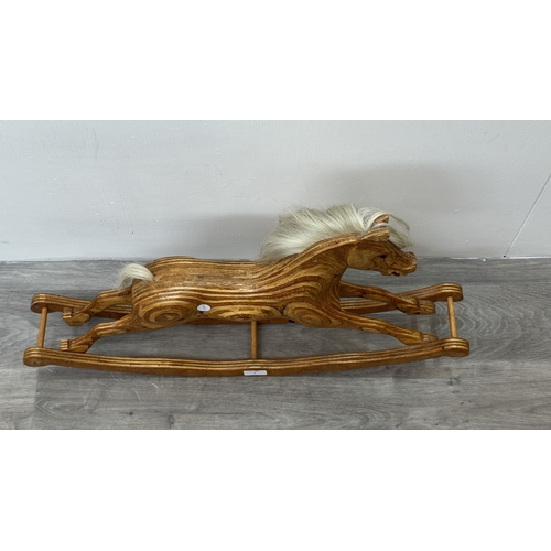 5 - A handcrafted wooden rocking horse with real hair and glass eyes - approx. 43cm high x 11cm wide x 7... 