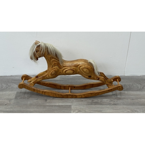 5 - A handcrafted wooden rocking horse with real hair and glass eyes - approx. 43cm high x 11cm wide x 7... 