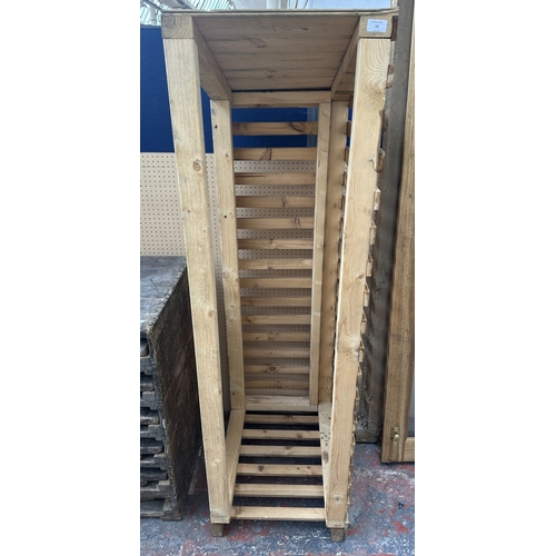 53 - A wooden log store - approx. 162cm high x 48cm wide x 66cm deep