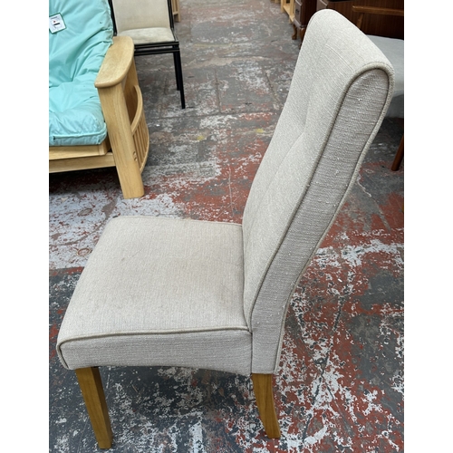 6 - A modern oak and glass top circular dining table and four grey fabric upholstered chairs - approx. 7... 