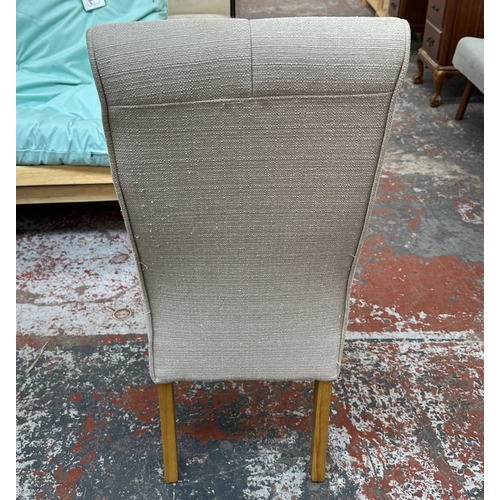 6 - A modern oak and glass top circular dining table and four grey fabric upholstered chairs - approx. 7... 