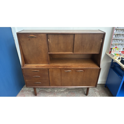 62 - A mid 20th century Jentique teak highboard - approx. 127cm high x 137cm wide x 41cm deep