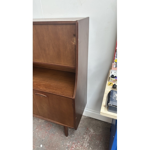 62 - A mid 20th century Jentique teak highboard - approx. 127cm high x 137cm wide x 41cm deep