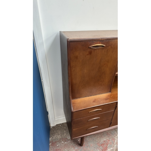 62 - A mid 20th century Jentique teak highboard - approx. 127cm high x 137cm wide x 41cm deep