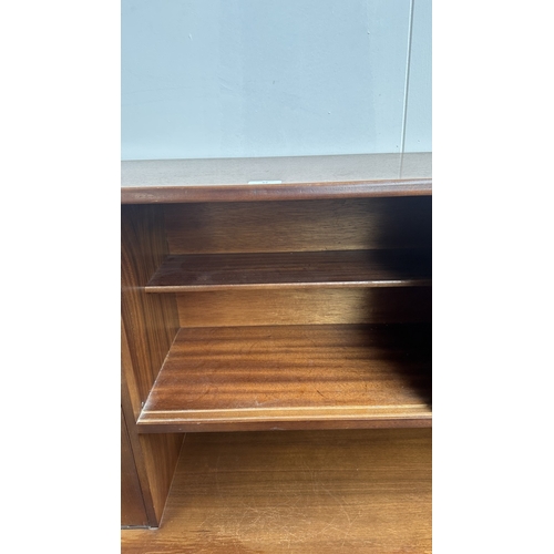 62 - A mid 20th century Jentique teak highboard - approx. 127cm high x 137cm wide x 41cm deep