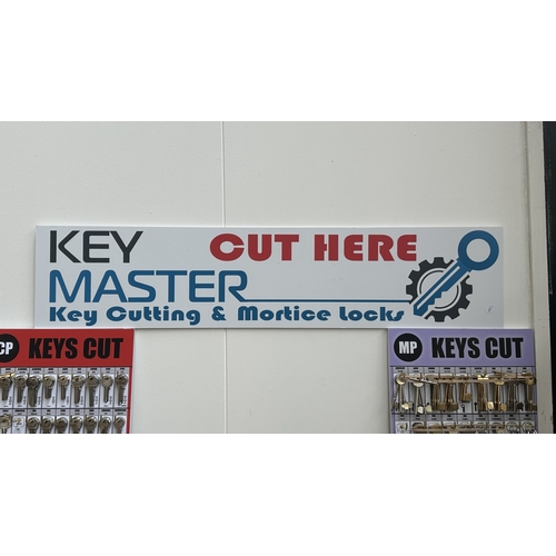 63 - An RST TM800 cylinder and mortice key cutting machine with a large quantity of keys, accessories and... 