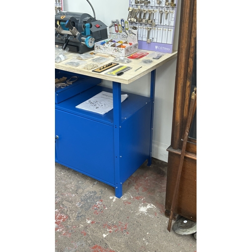 63 - An RST TM800 cylinder and mortice key cutting machine with a large quantity of keys, accessories and... 