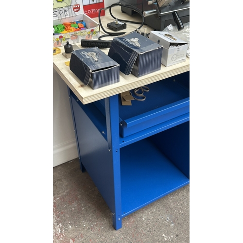 63 - An RST TM800 cylinder and mortice key cutting machine with a large quantity of keys, accessories and... 