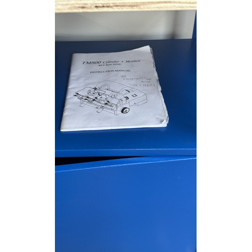 63 - An RST TM800 cylinder and mortice key cutting machine with a large quantity of keys, accessories and... 