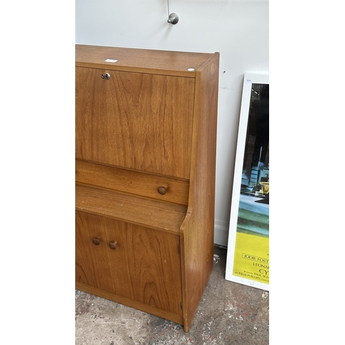 63B - A mid 20th century Remploy teak bureau - approx. 99cm high x 61cm wide x 35cm deep